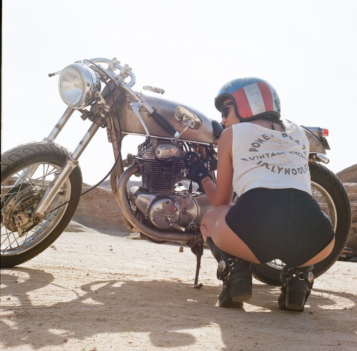 A playful frame from Girls on a motorcycle — online in Atlanta